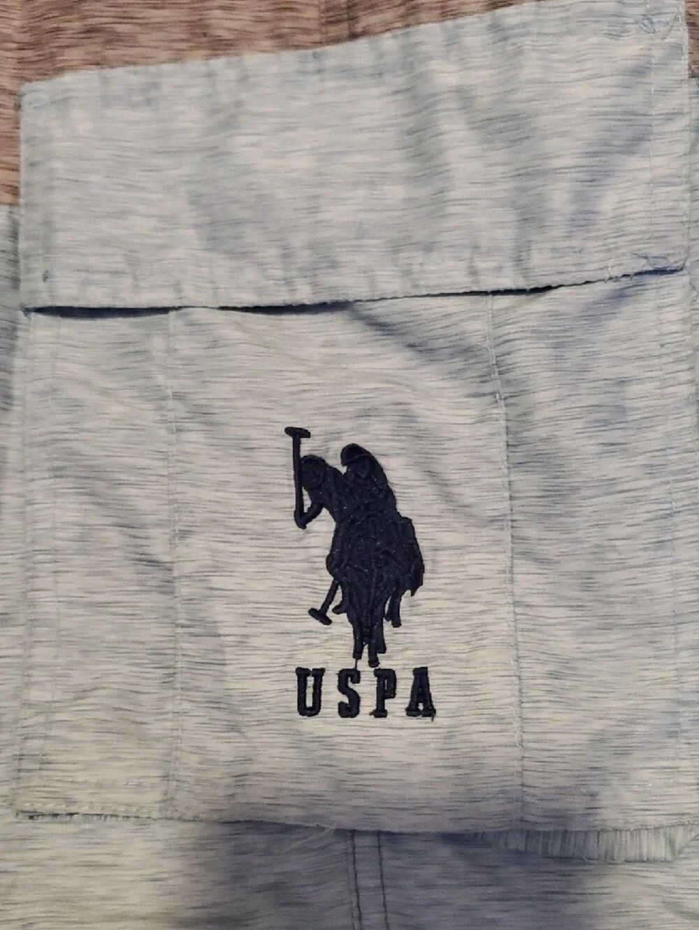 U.S. Polo Assn. Men’s Three-Tone Navy, Gray, and Light Blue Swim Trunks